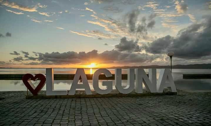 Ampla Cobertura Na Praia Do Mar Grosso Laguna Buitenkant foto